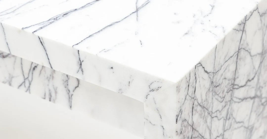 Close-up of New York marble desk surface — hand-carved natural stone finish