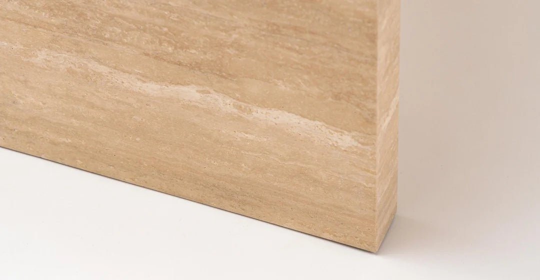 Travertine Navona desk leg detail — solid stone base carved from matching block