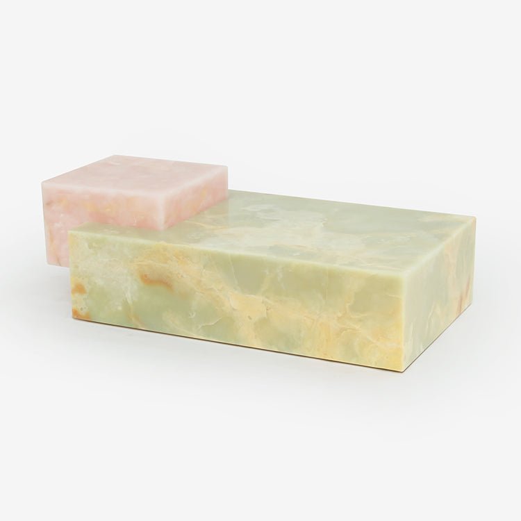Close up of pink onyx block showing blush tone and natural stone variation