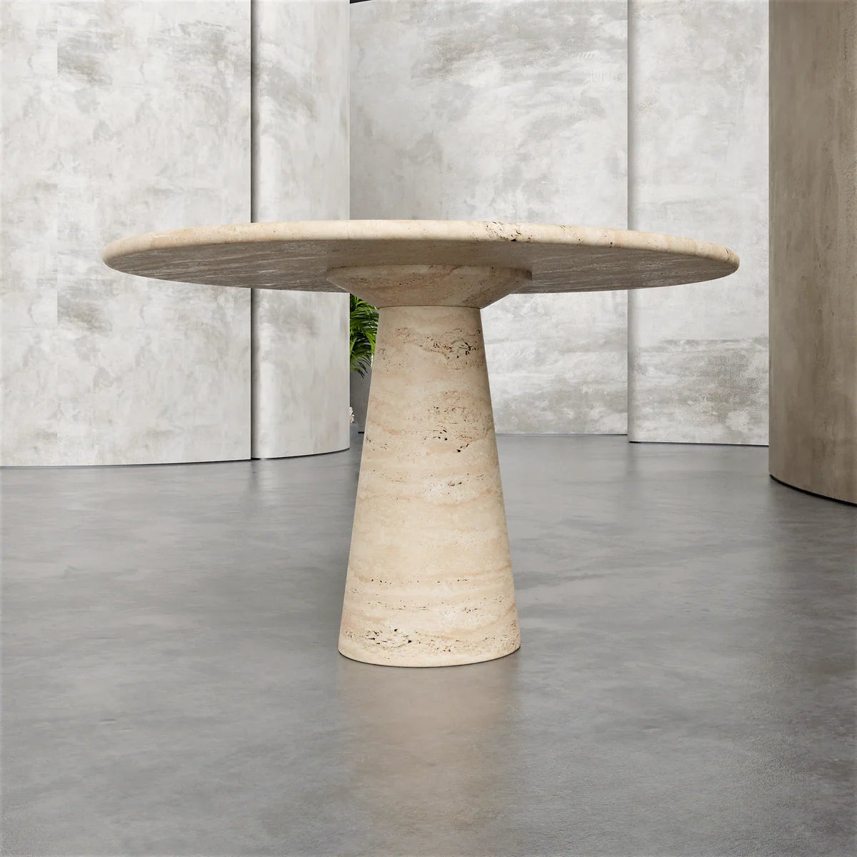 Franca travertine dining table base detail — single conical stone pedestal