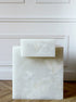 Sorrento marble and onyx plinth showcasing the natural veining and texture of the stone, ideal for display.