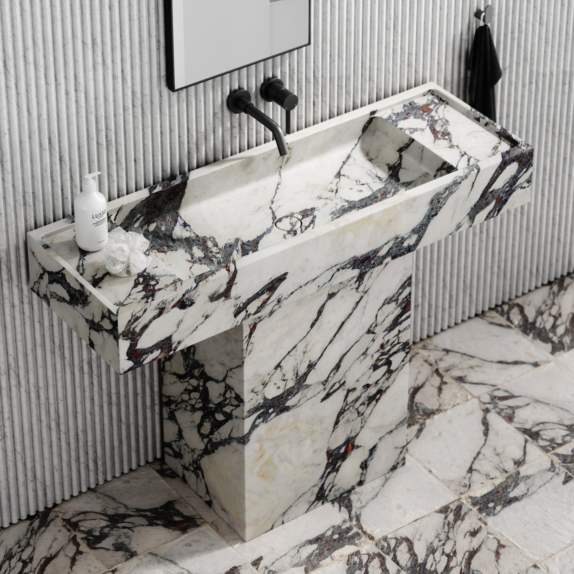 Calacatta Viola Pedestal Basin — overhead view showing carved basin interior and marble waste cap