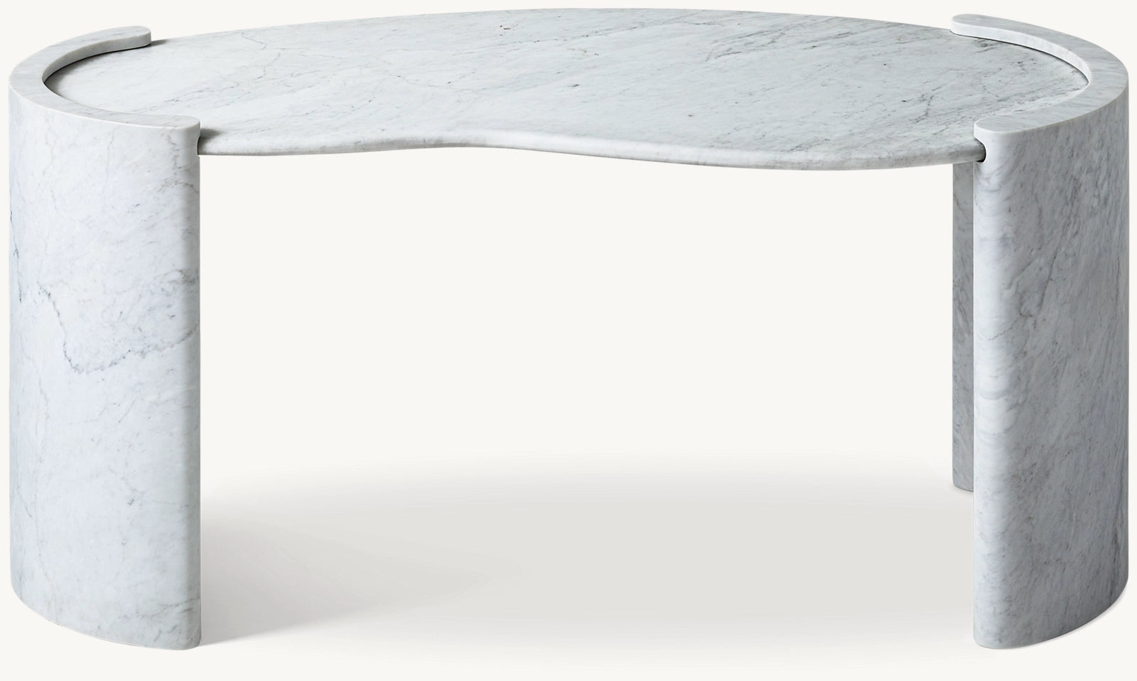 Coco marble desk in Carrara — organic curved white marble top with solid stone column legs, front view