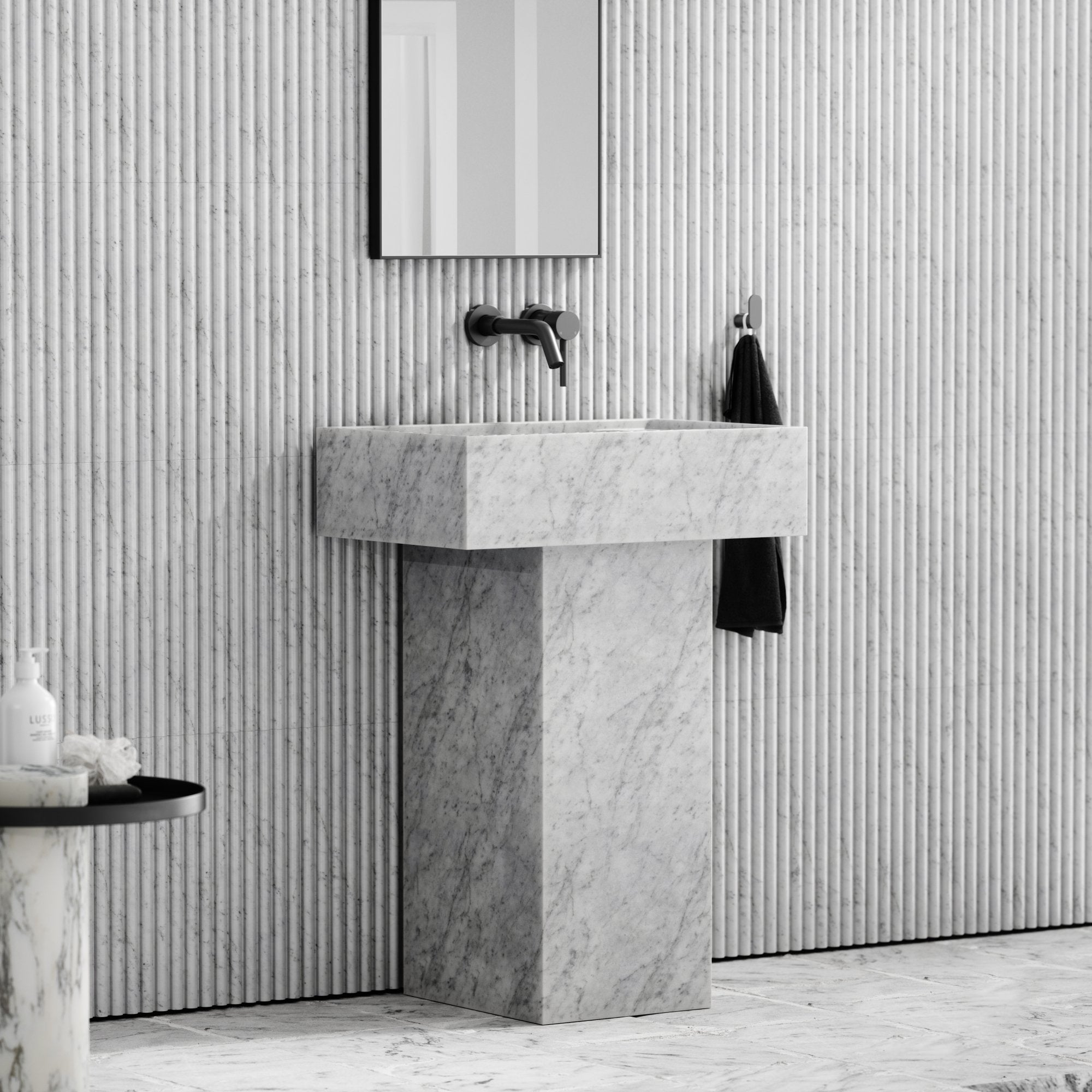 Carrara marble vanity 600mm side profile showing column base and basin depth