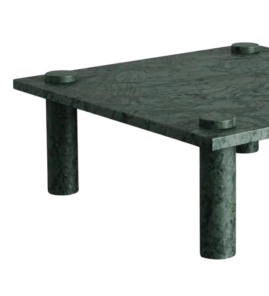 Adamo Verde Guatemala coffee table corner detail showing cylinder leg extending above tabletop surface