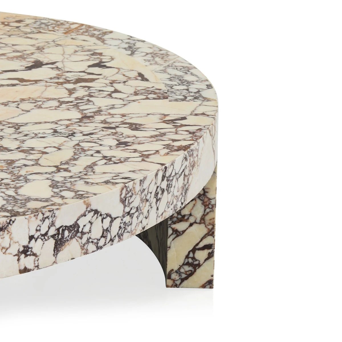 Calacatta Viola marble surface detail — white base with deep purple-black and grey veining
