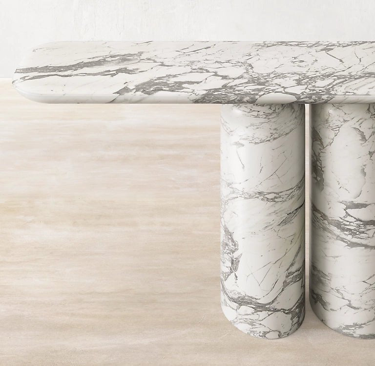 Close up of Venetino Statuario marble console top showing precise grey veining on bright white background